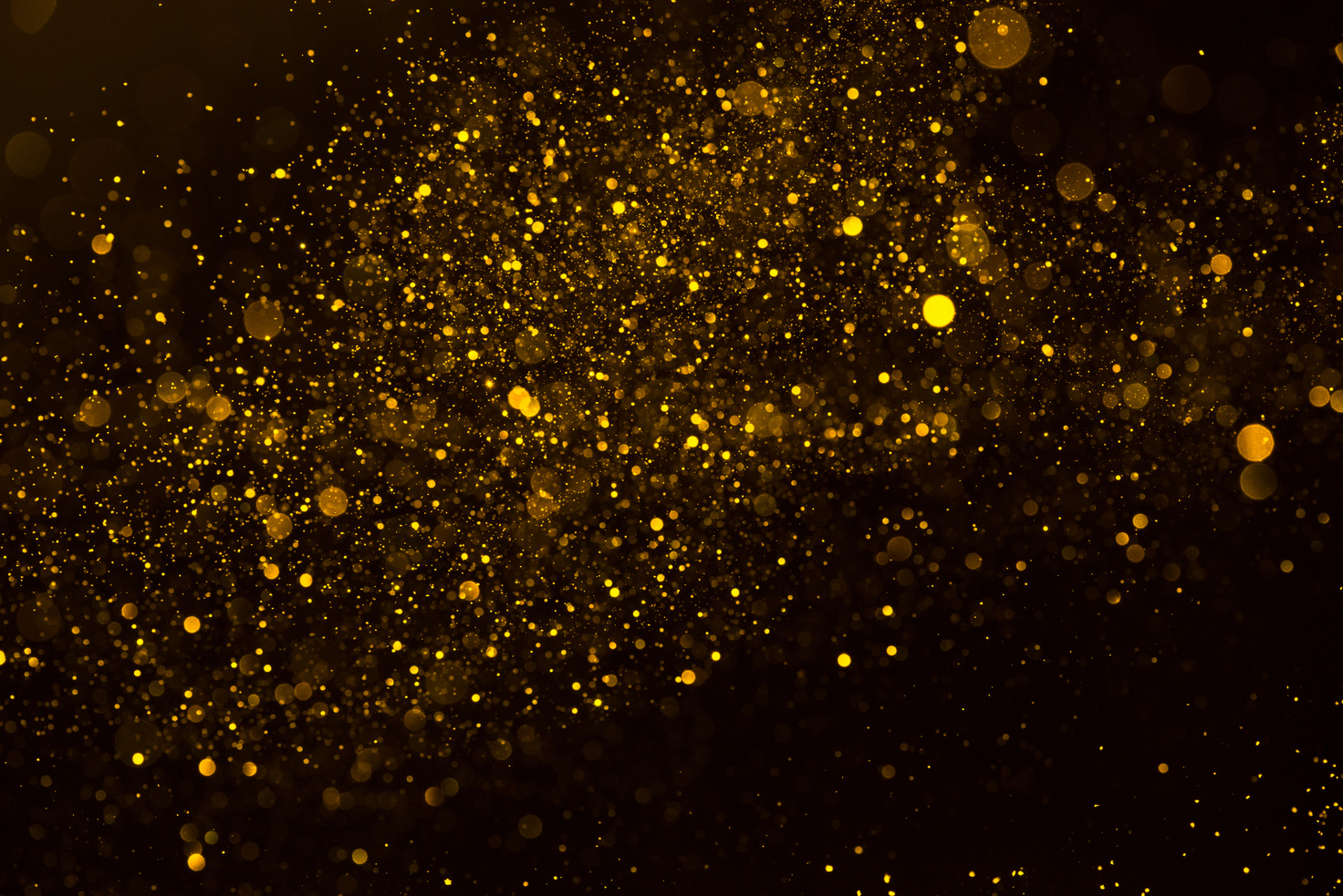 Magic glowing gold dust particles